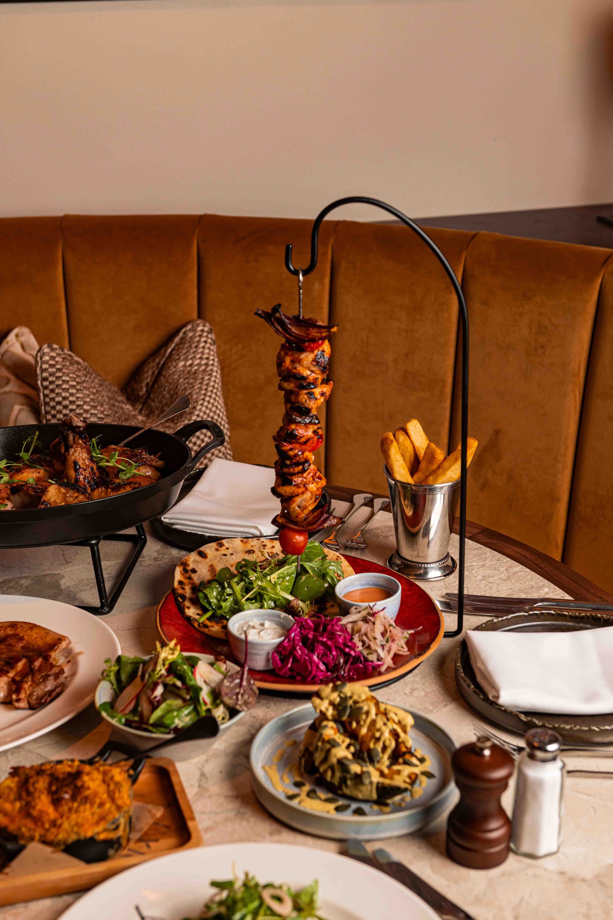 The hanging kebabs, chips and Grilled pumpkin, spiced smoked labneh