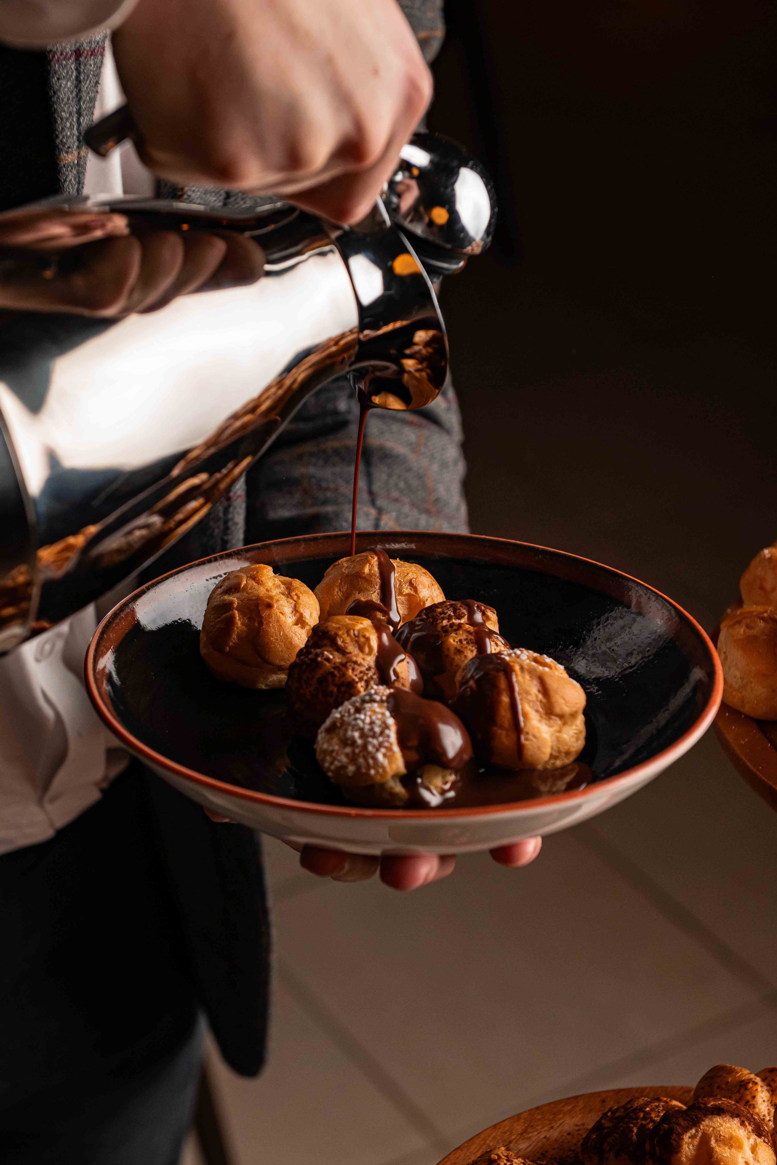 Profiterole smothered in chocolate