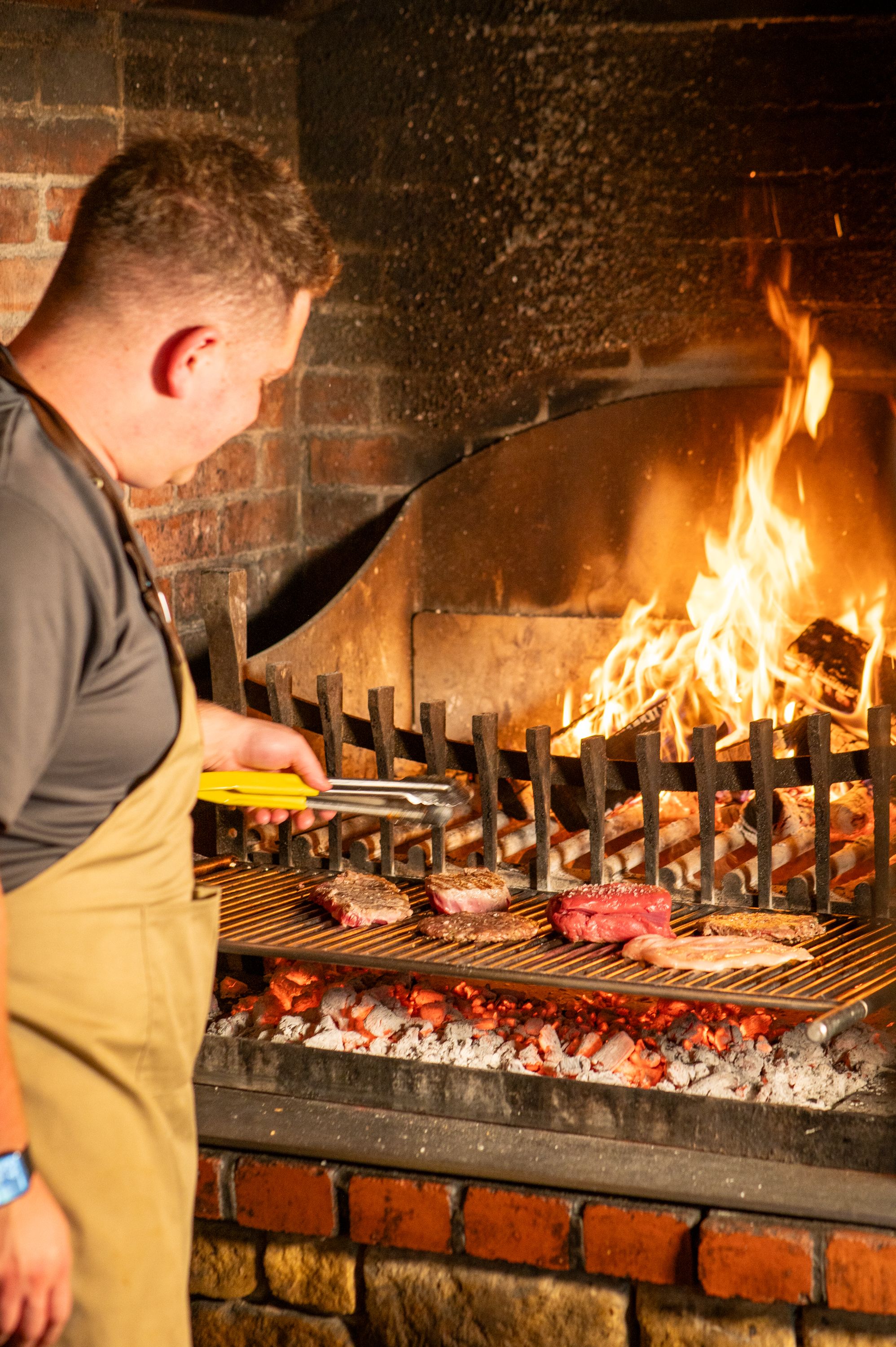Meat on open air grill